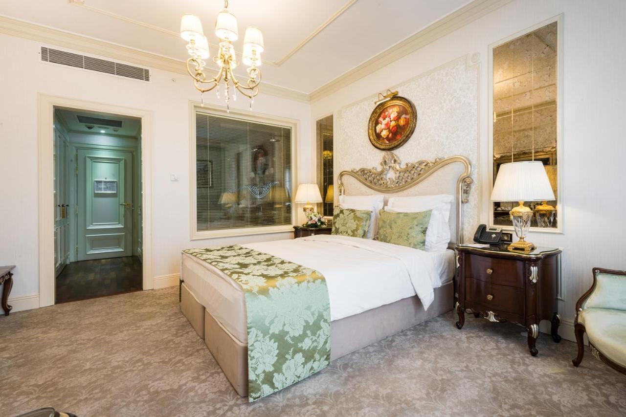 Rixos Khadisha Shymkent Hotel Kültér fotó A bedroom at the hotel