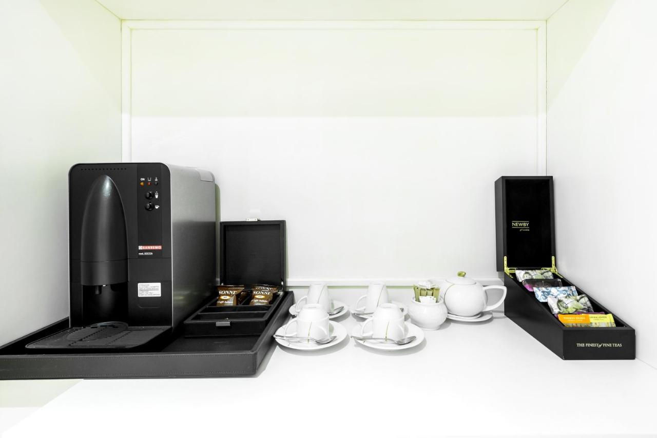 Rixos Khadisha Shymkent Hotel Kültér fotó A coffee machine